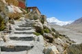 CLOSE UP: Scenic shot of stairs leading up to Buddhist monastery under Everest Royalty Free Stock Photo