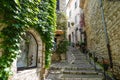 CLOSE UP: Scenic view of the empty stairs leading up the romantic alleyway. Royalty Free Stock Photo