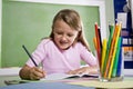 Close-up of school girl writing in notebook Royalty Free Stock Photo