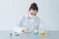 Close Up Of Scientist Checking Test Tube In Laboratory