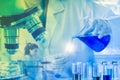 Close up, scientist dropping blue liquid into test tubes