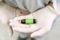 Close up of scientist holding bottle of vaccine developed for corona virus. Covid-19 antidote. Doctor discovers treatment for Royalty Free Stock Photo