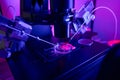 Close up of scientist laboratory worker doing microinjections