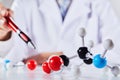 Close up of scientist with molecular models Royalty Free Stock Photo