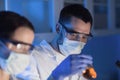 Close up of scientists making test in lab Royalty Free Stock Photo