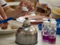 Close-up of scissors being sterilized with an alcohol burner before cut the food samples. Medicine and microbiology concept Royalty Free Stock Photo