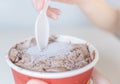 Close up of scoop chocolate ice cream by spoon