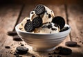 A close-up of a scoop of cookies and cream ice cream with Oreo cookies on top.