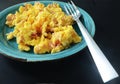 Close up of scrambled eggs with ham breakfast