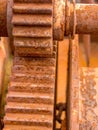 Close up on scraped rusted cogwheel