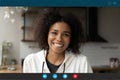 Screen view of smiling biracial woman have webcam call Royalty Free Stock Photo