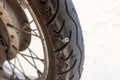 close up of screw nail puncturing car tire,motorcycle tire and bicycle tire