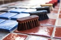 close-up of scrubbing brushes on freshly washed tiles Royalty Free Stock Photo