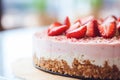 Close-up of scrumptious strawberry cheesecake with empty space for ads or blog posts