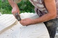 Close up of sculptor hands is working