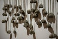 Close-up of a sculpture composed of a pile of stones and pebbles indoors