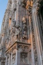 Close up of sculpture that decorating around Duomo di Milano church in the early morning, Milan Italy