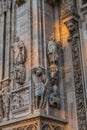 Close up of sculpture that decorating around Duomo di Milano church in the early morning, Milan Italy