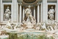 A close up of the sculptures at the front of the Trevi Fountain in Rome, Italy