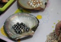 Cultured black Pearl sizing