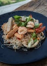 Close-up Of Seafood Spicy Glass Noodle Salad Or Spicy Delicious Mung Bean Noodle Salad With Fresh Seafood Yum Woon Sen On Wooden