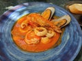 Close up seafood stew soup or Bouillabaisse, western menu, mussels, squid, shrimp or prawn, in Tomato Broth, popular in Royalty Free Stock Photo