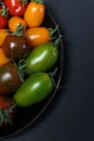 a close up of multicolored tomatoes