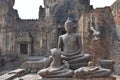 Close-up of Seated Buddha in brick annex, east of central tower of Phra Prang Sam Yod, Lopburi, Thailand