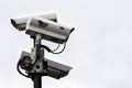 Close Up of a Security CCTV Cameras on a lamp post Royalty Free Stock Photo