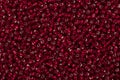 Close up of seed beads of dark red color. Royalty Free Stock Photo