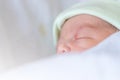 Close up and Selective focus of asian newborn baby boy sleeping at hospital Royalty Free Stock Photo