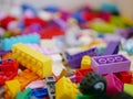 Close up and selective focus of colorful interlocking plastic bricks