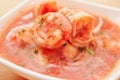 Close up of selective focus in a delicious shrimps of Ecuadorian food: shrimp cebiche in a blurred background