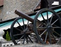 Close up selective focus image of an old medieval wooden wheeled cannon located in Sinaia, Romania