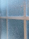 Mosaic patterned, removable privacy film on an interior window, to keep people from seeing inside