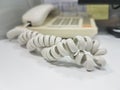 Close-up selective focus of tangled wires on vintage telephone handset Royalty Free Stock Photo