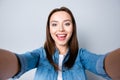 Close up self-portrait of happy brunette pretty girl with beam