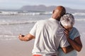 Close up of senior african american couple dancing together on the beach Royalty Free Stock Photo