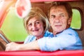Close Up Of Senior Couple Inside A Pickup Truck