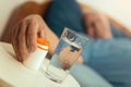 Close up of senior man hands with bottle of pills Royalty Free Stock Photo