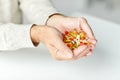 Close up of senior man hands holding pills Royalty Free Stock Photo