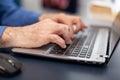 Close up of senior man hands typing Royalty Free Stock Photo