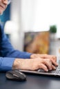 Close up of senior man hands typing Royalty Free Stock Photo