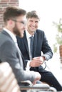 Close-up of a senior manager talking to a colleague. Royalty Free Stock Photo