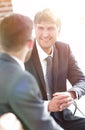 Close-up of a senior manager talking to a colleague. Royalty Free Stock Photo