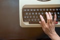 Close up of Senior secretarial typing the memo Royalty Free Stock Photo