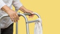 Senior woman using a walker cross street with caregiver Royalty Free Stock Photo