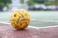 Close up Sepak takraw or Rattan ball in outdoor field with copy space.