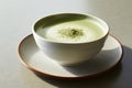 Close up of serene setting with a white cup of matcha green tea latte, relaxing and refreshing drink Royalty Free Stock Photo