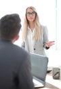 Serious business woman talking to her colleague Royalty Free Stock Photo